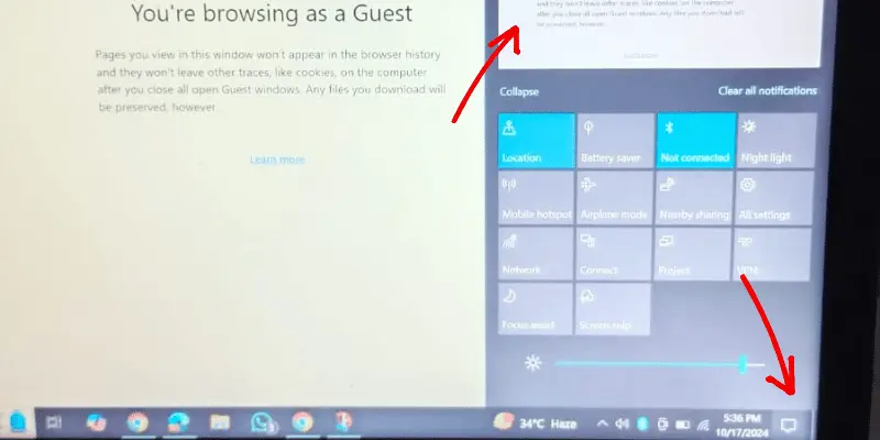 Chrome guest browsing session with Windows quick settings and notifications panel open
