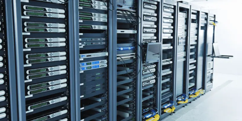 Professional data center with multiple server racks containing network equipment and enterprise hardware Professional data center with multiple server racks containing network equipment and enterprise hardware