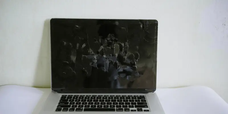 Overheated laptop screen with visible damage from high temperatures.