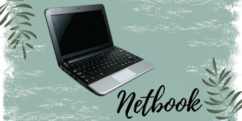 Netbook displayed on a nature-inspired background with leaf designs
