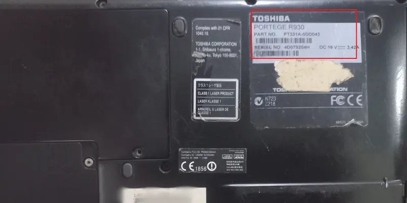 Bottom of Toshiba Portégé R930 laptop showing model and serial number label