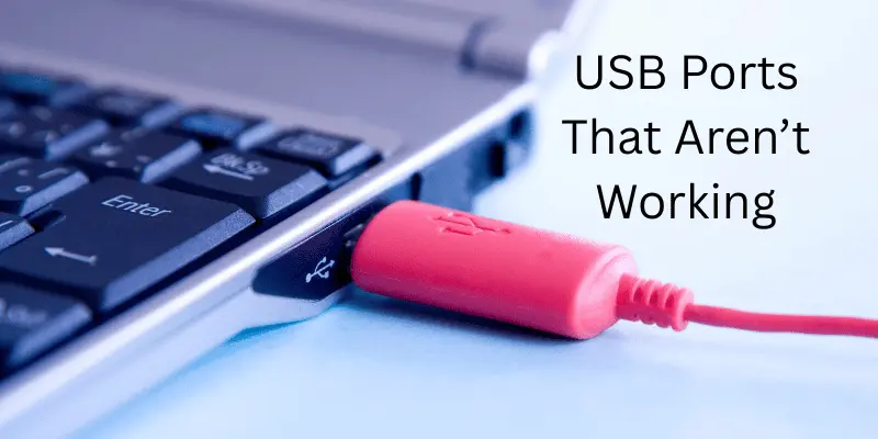 Close-up of red USB plugged into a non-functional laptop USB port. Close-up of red USB plugged into a non-functional laptop USB port.